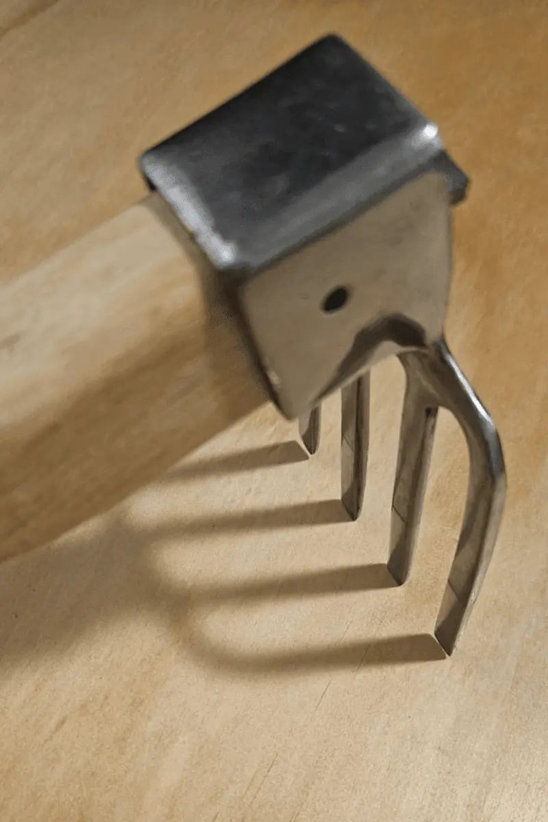 One-handed forged stainless steel garden fork - East-West Tools