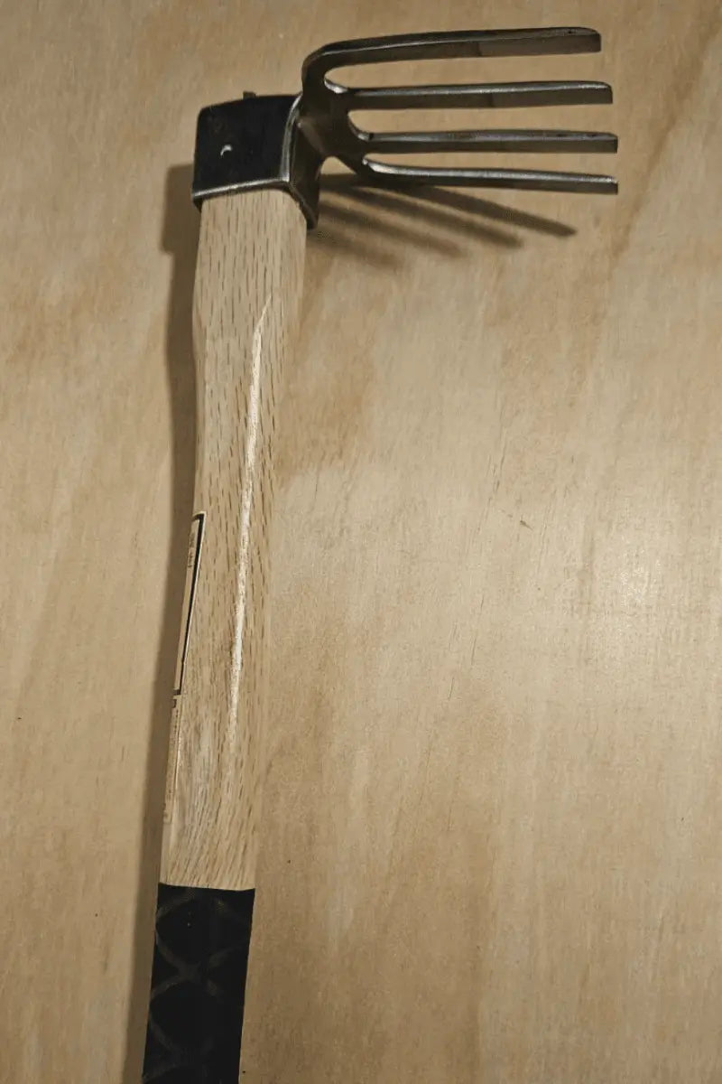 One-handed forged stainless steel garden fork - East-West Tools