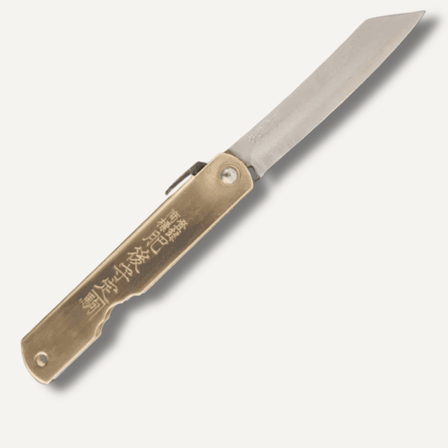 Higonokami Aogami pocket knife closed, showing traditional folded handle on white background