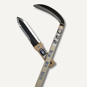 Two gardening tools with Japanese text on handles against a white background