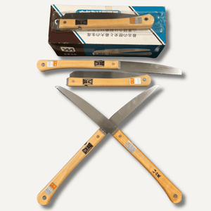 Set of folding saws with wooden handles on a white background