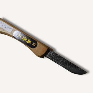 Knife with wooden handle and black blade on a white background