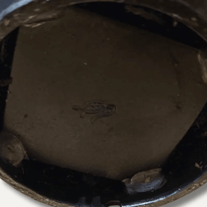 close up of a forged iron flower pot