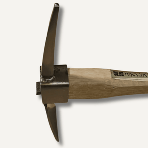 Close-up of a traditional Japanese sword on a white background