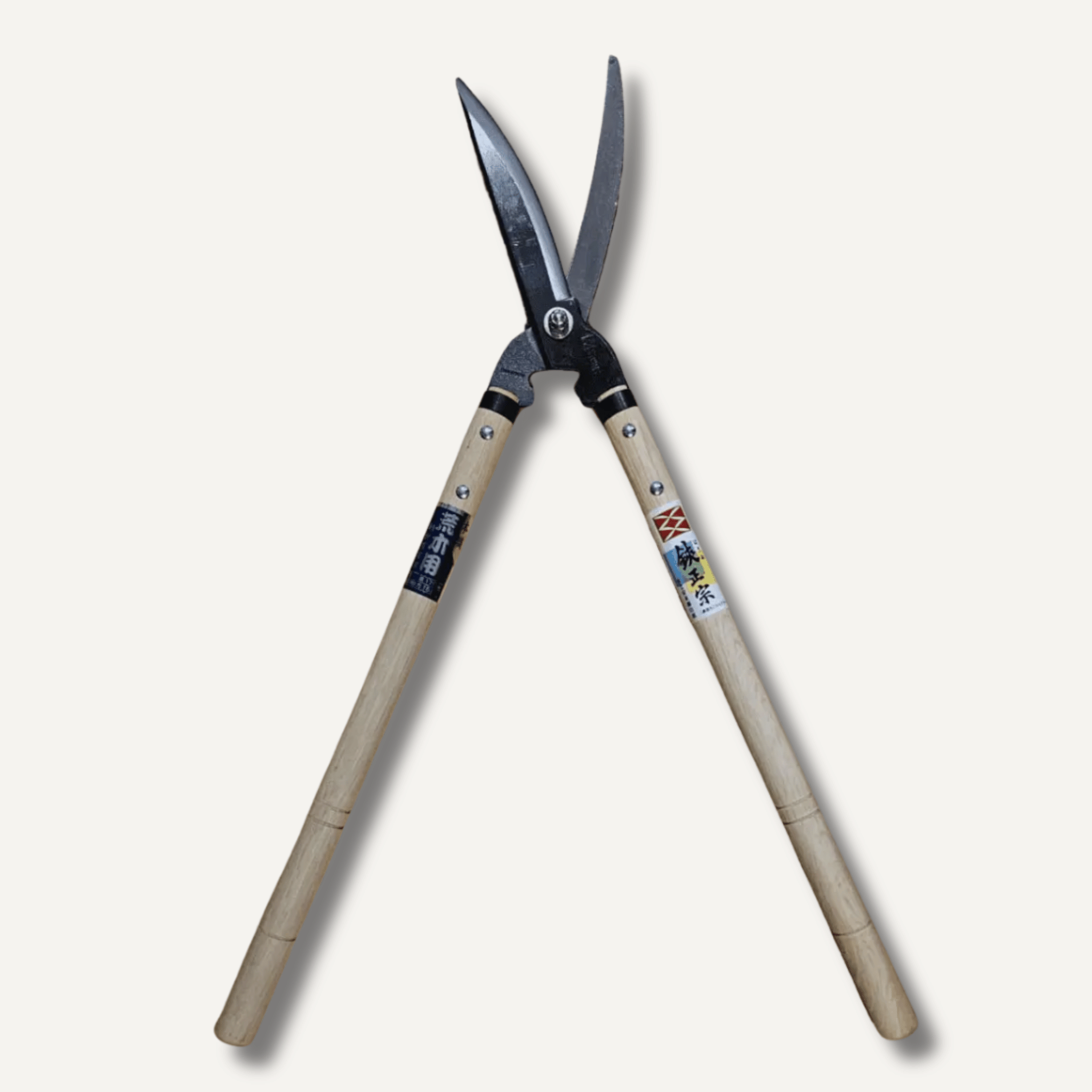 Pair of garden shears with wooden handles on a white background