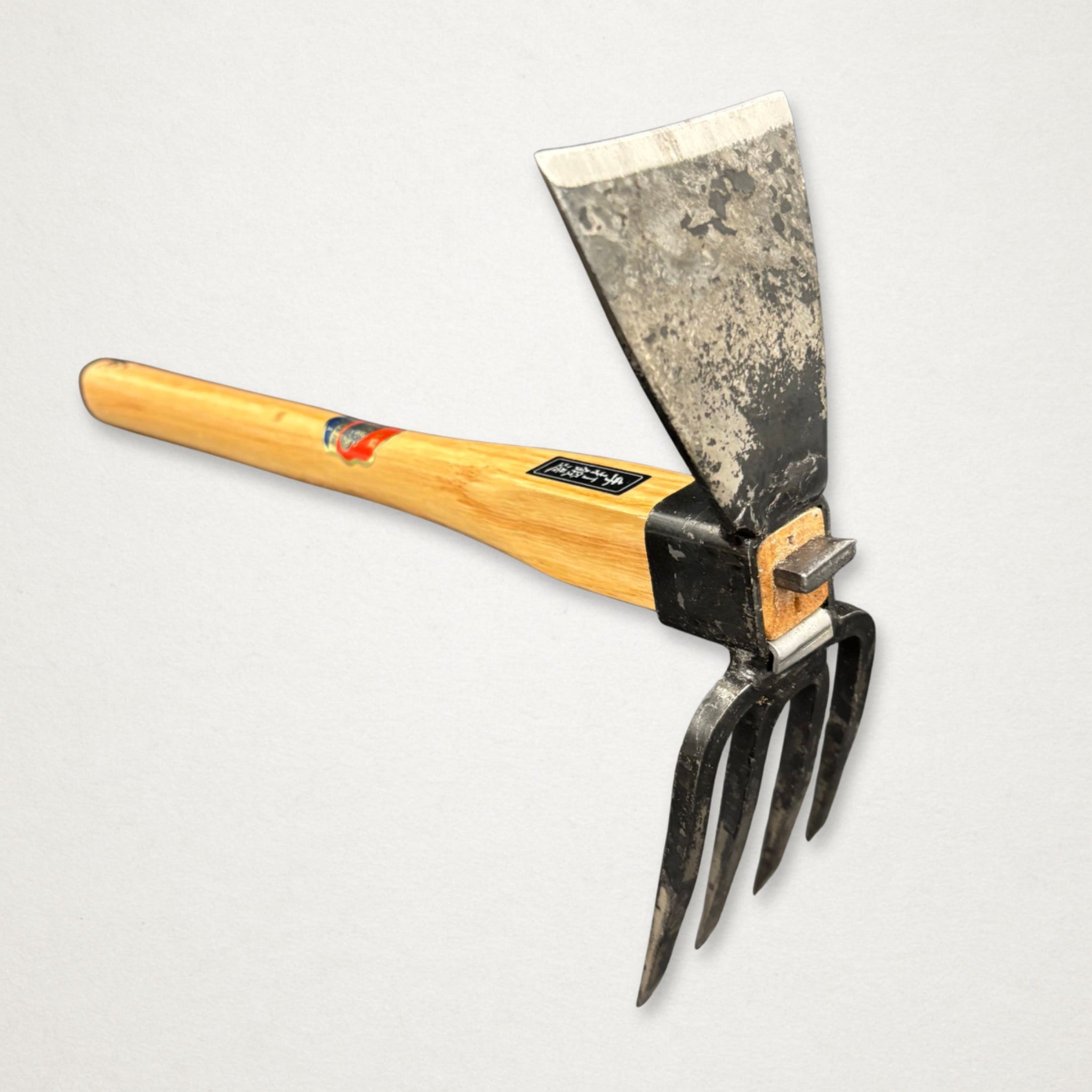 Azui No.102 Japanese hand hoe head detail showing flat hoe blade and forged tines