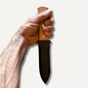 Gyokcho 50c carbon steel hori hori knife held in hand