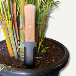Gyokucho Hori Hori Knife in plant pot