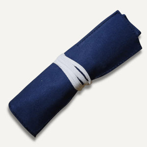 Ikeuchi Hamono 6 piece carving knife set rolled up in blue canvas wrap