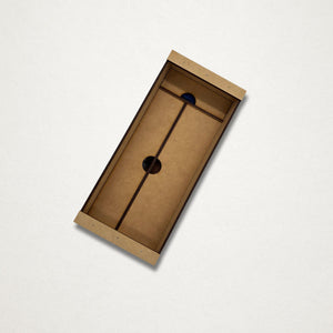Handmade wooden toolbox for a Japanese garden tool maintenance kit, shown closed with removable sliding lids and a storage space for 200mm secateurs.