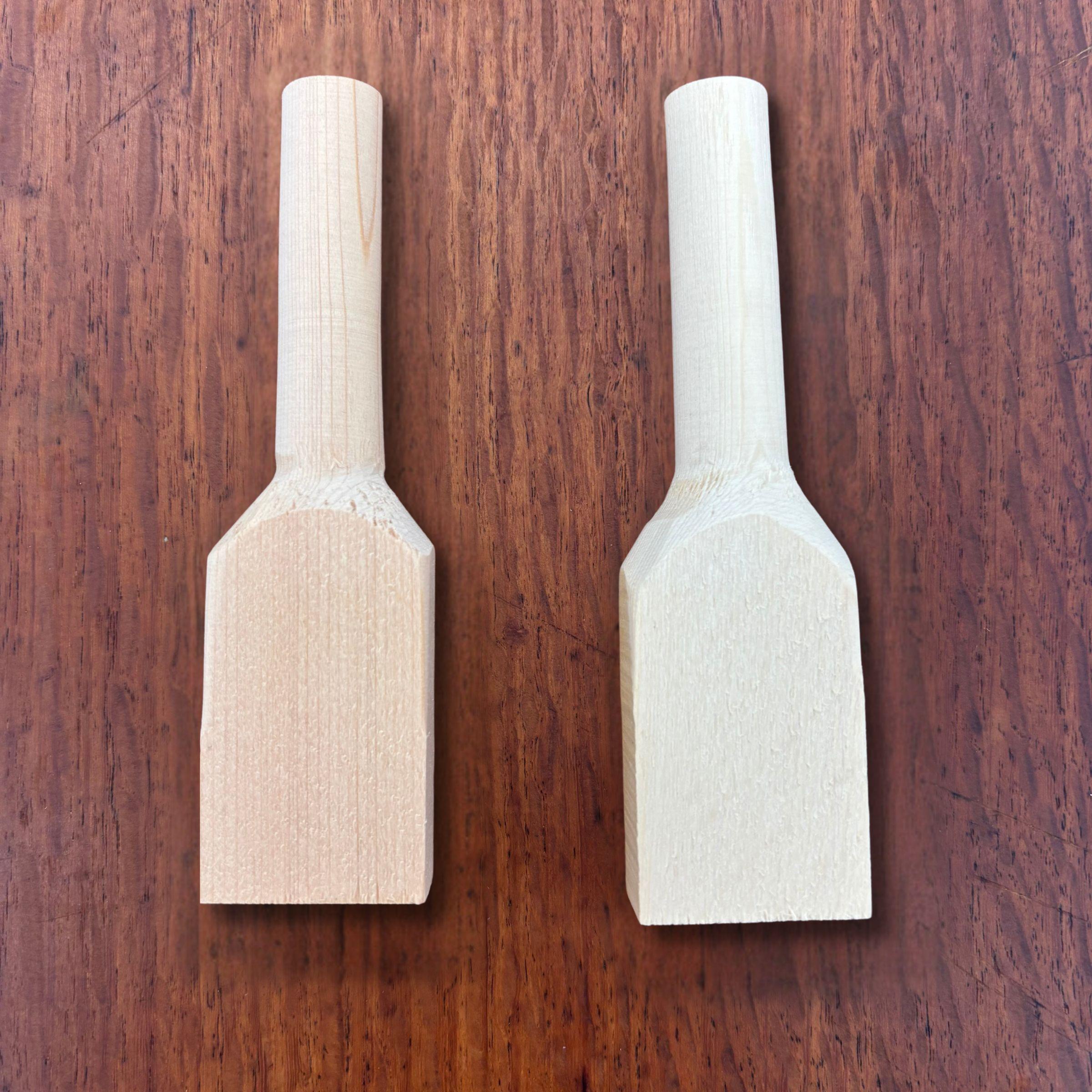 Front and back view of hinoki teaspoon carving blanks on a timber surface