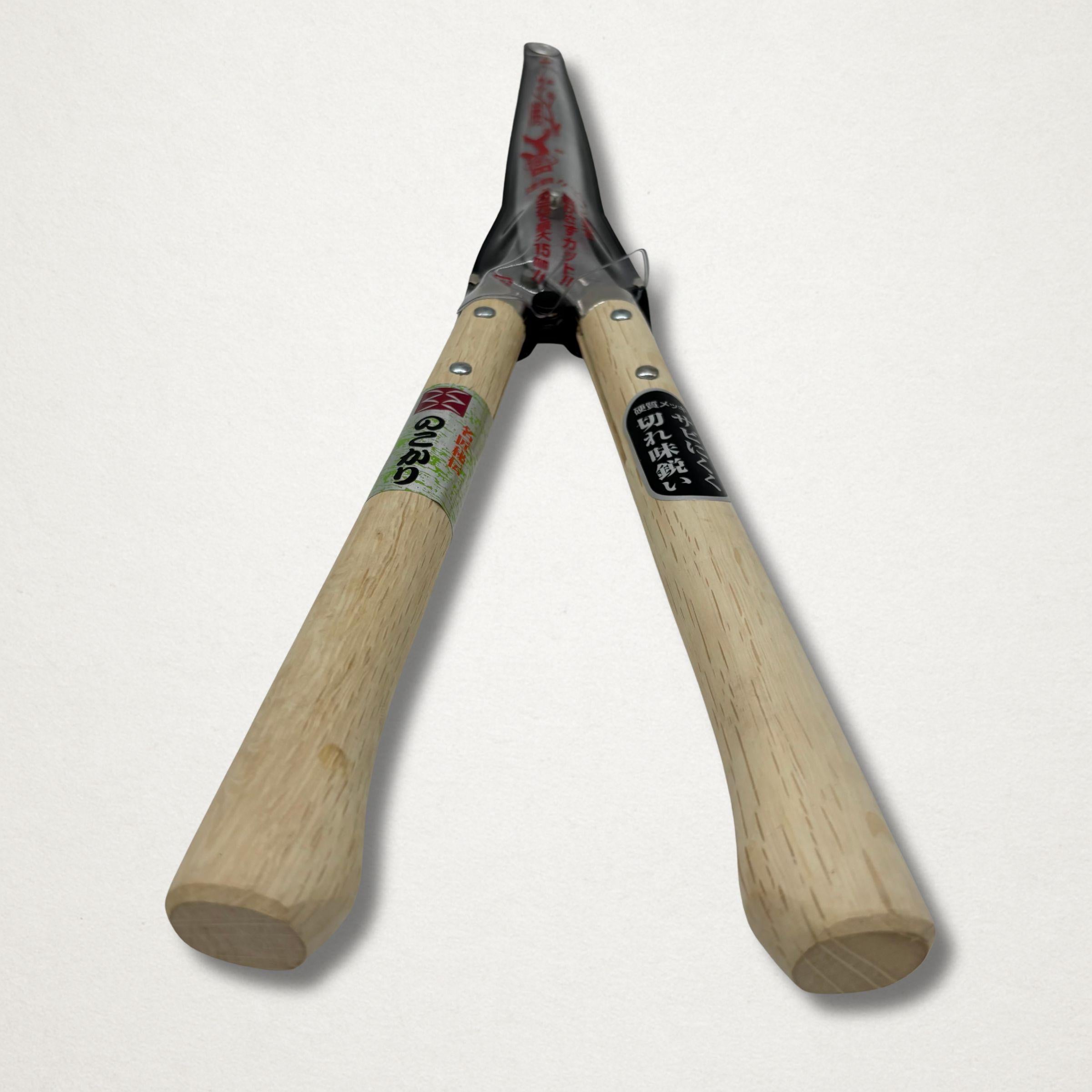 180mm nokokari shears close up laying flat, with blade cover