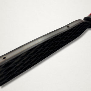 Side view of the Shinto saw rasp showing the blade profile and red handle