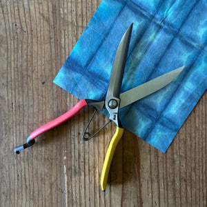 Tobisho Topiary Clippers 270mm – straight blade topiary clippers partially open on indigo washi paper background