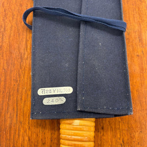 Vintage Japanese dozuki saw in dark blue cloth blade cover showing 240 mm size and original ¥13,700 price label