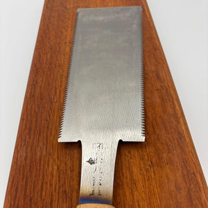 Close-up of tang stamp, visible patina spot and heat temper colouring above the handle