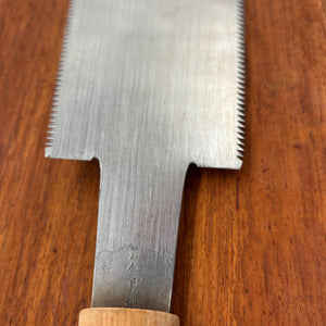 Close-up of maker stamp on tang of vintage 210mm Japanese ryoba saw